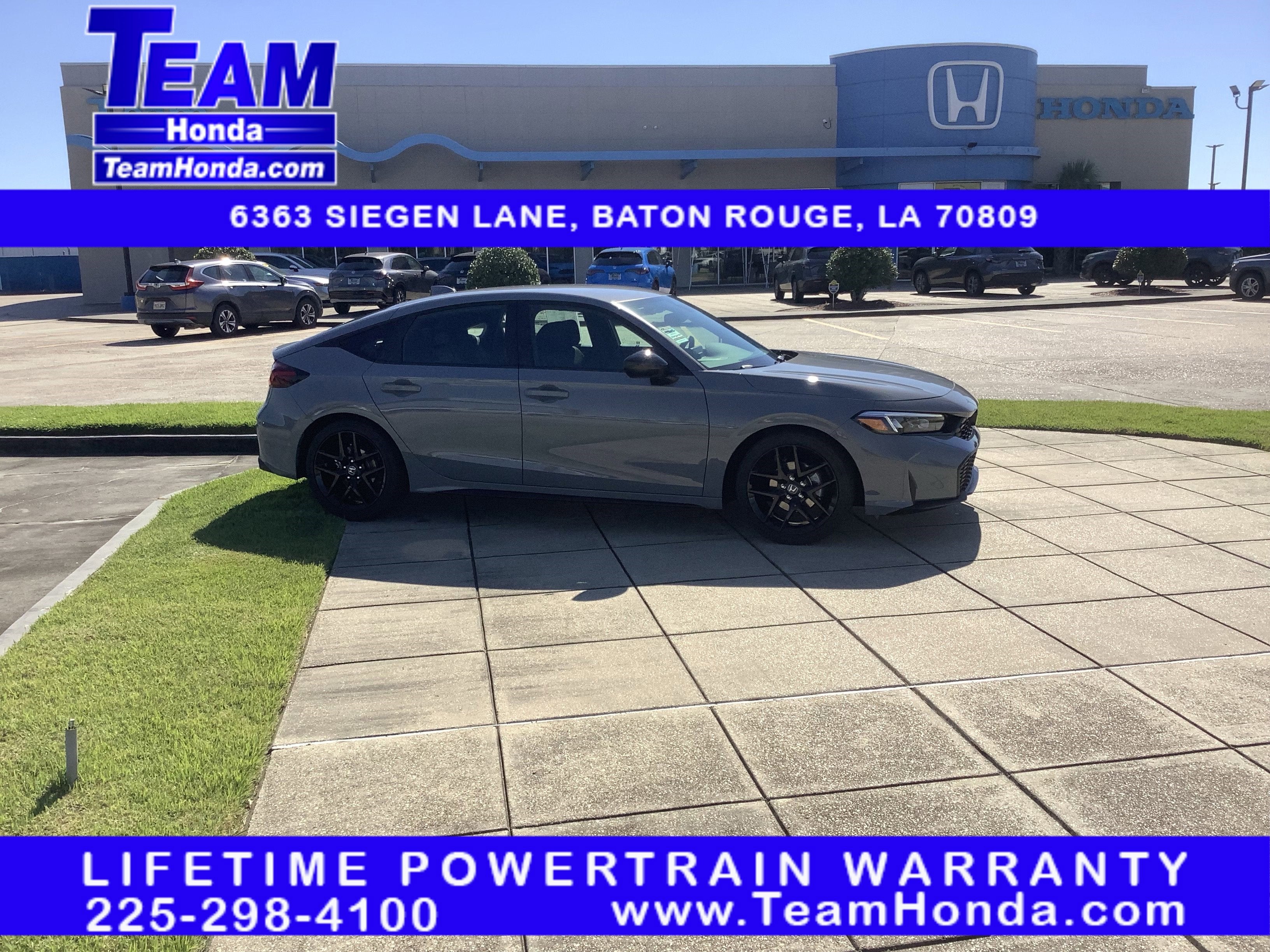 2026 Honda Civic Hatchback Sport in Urban Gray Pearl — front three-quarter view
