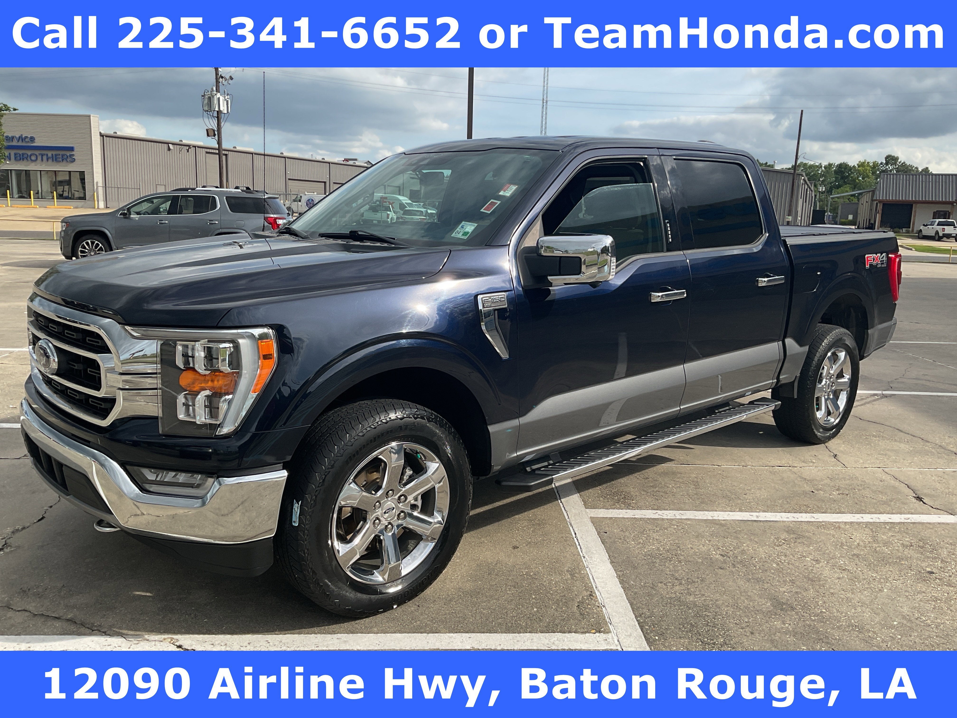 2021 Ford F-150 XLT in Antimatter Blue Metallic — front three-quarter view