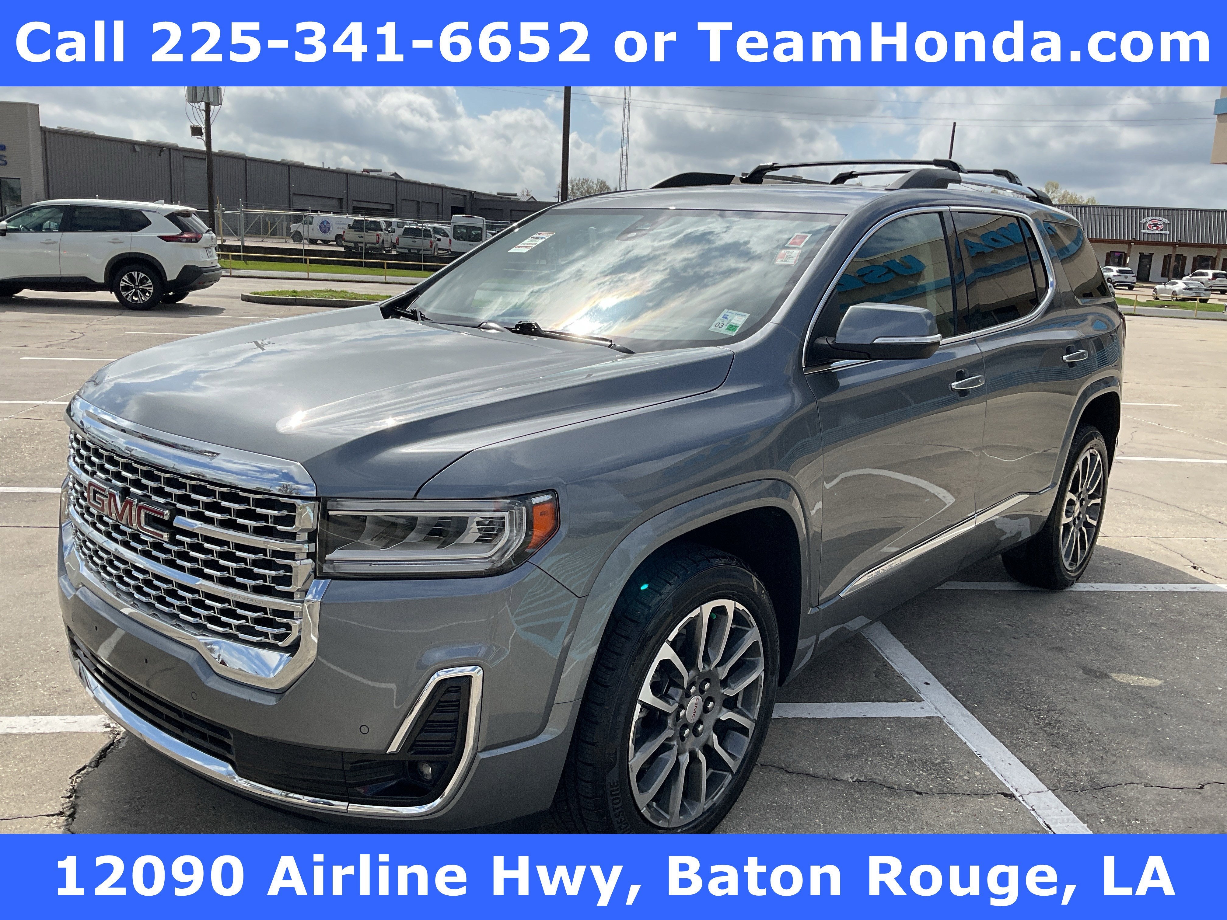 2022 GMC Acadia Denali in Satin Steel Metallic — front three-quarter view