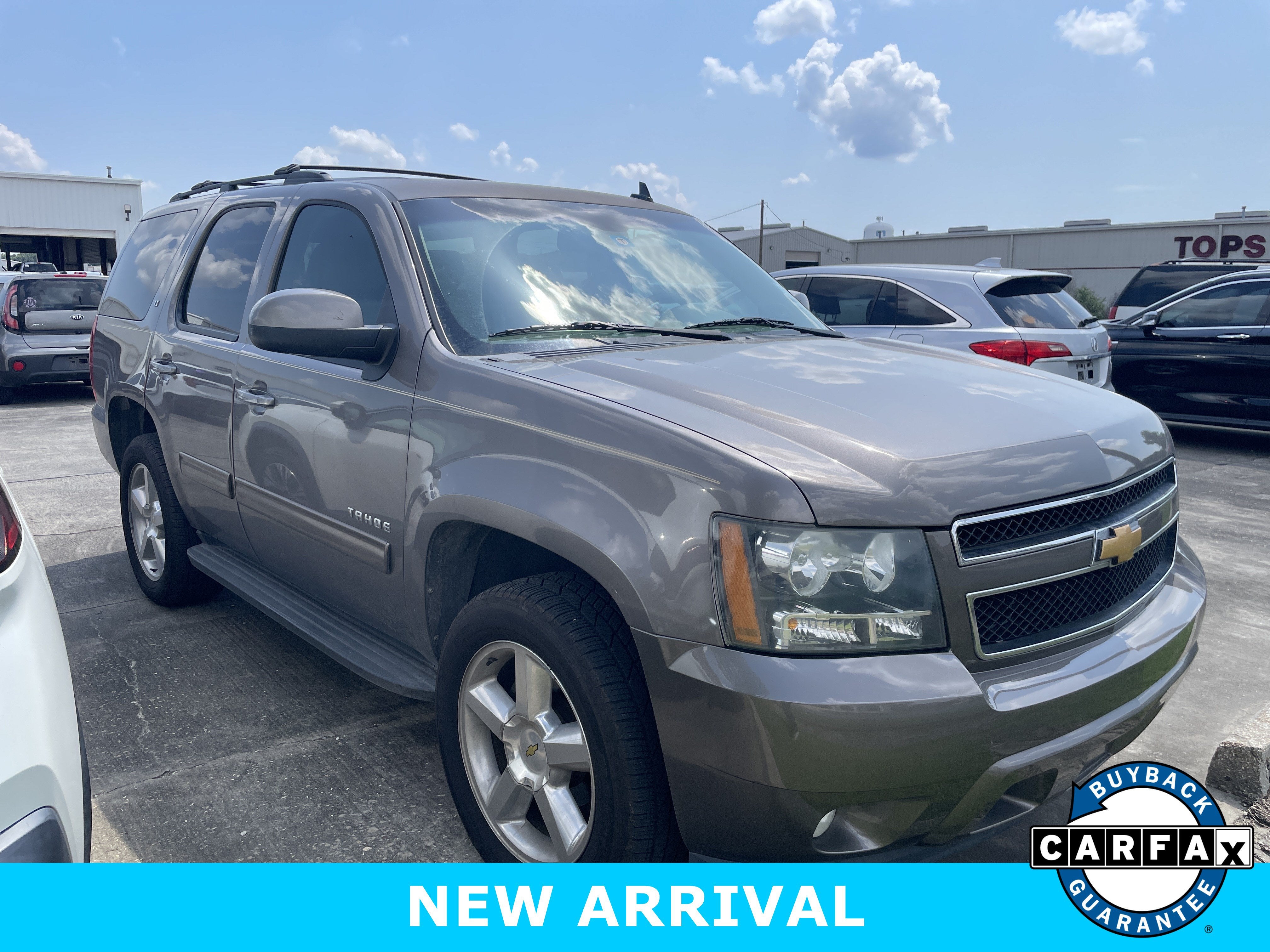 2014 Chevrolet Tahoe LT in Mocha Steel Metallic — front three-quarter view