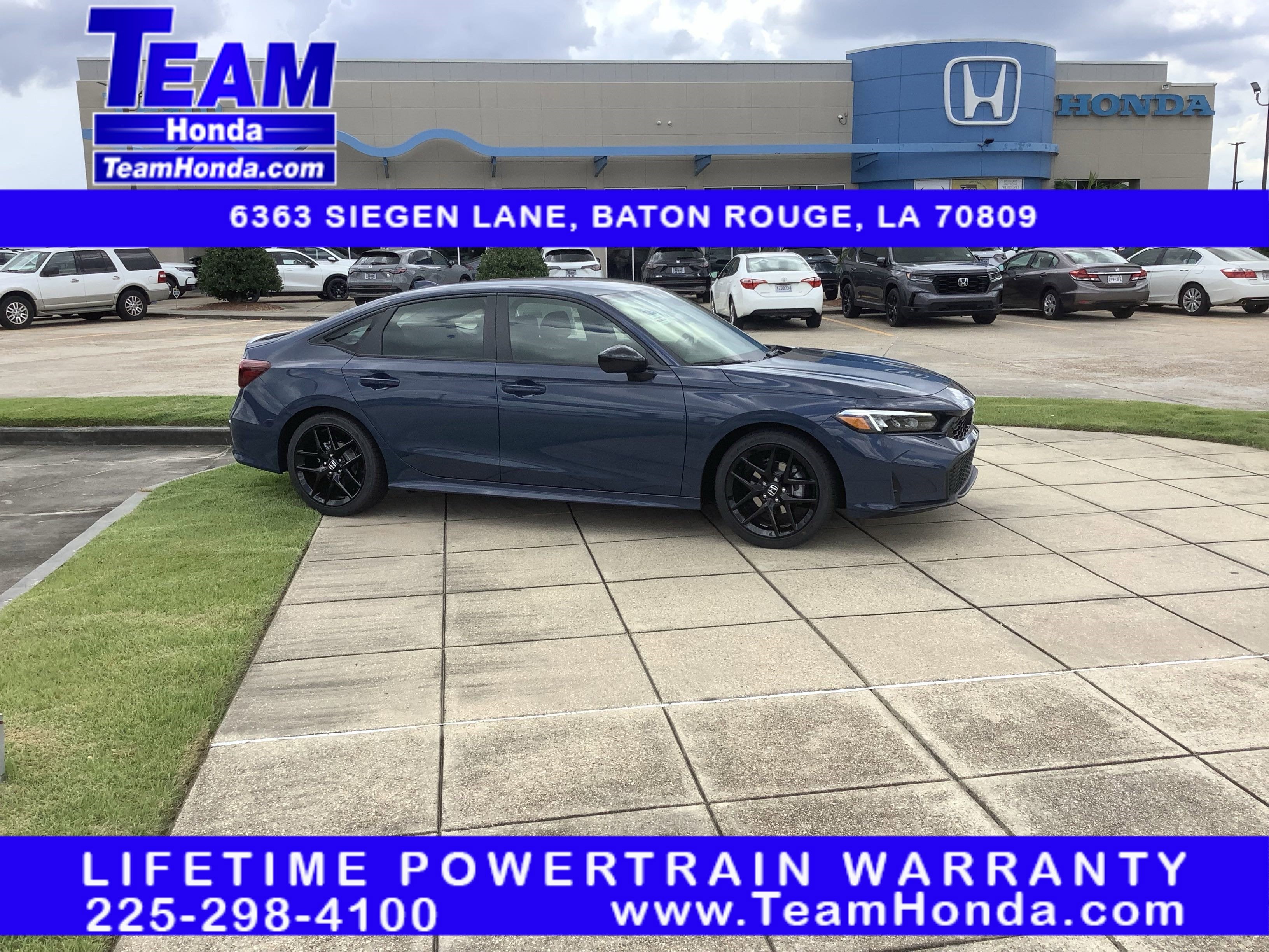 2026 Honda Civic Sedan Sport in Blue Lagoon Pearl — front three-quarter view