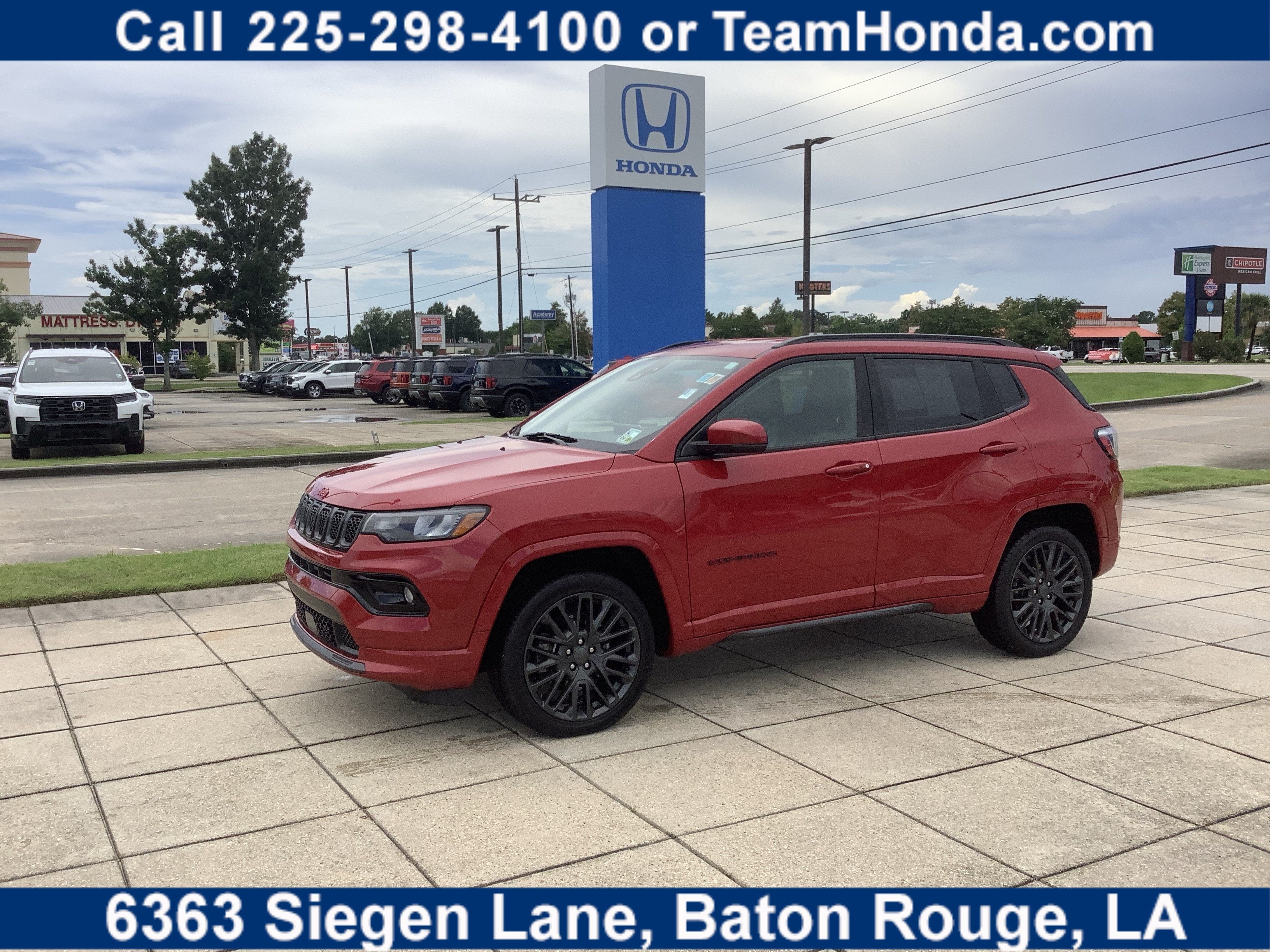 2023 Jeep Compass (RED) Edition in Redline Pearlcoat — front three-quarter view