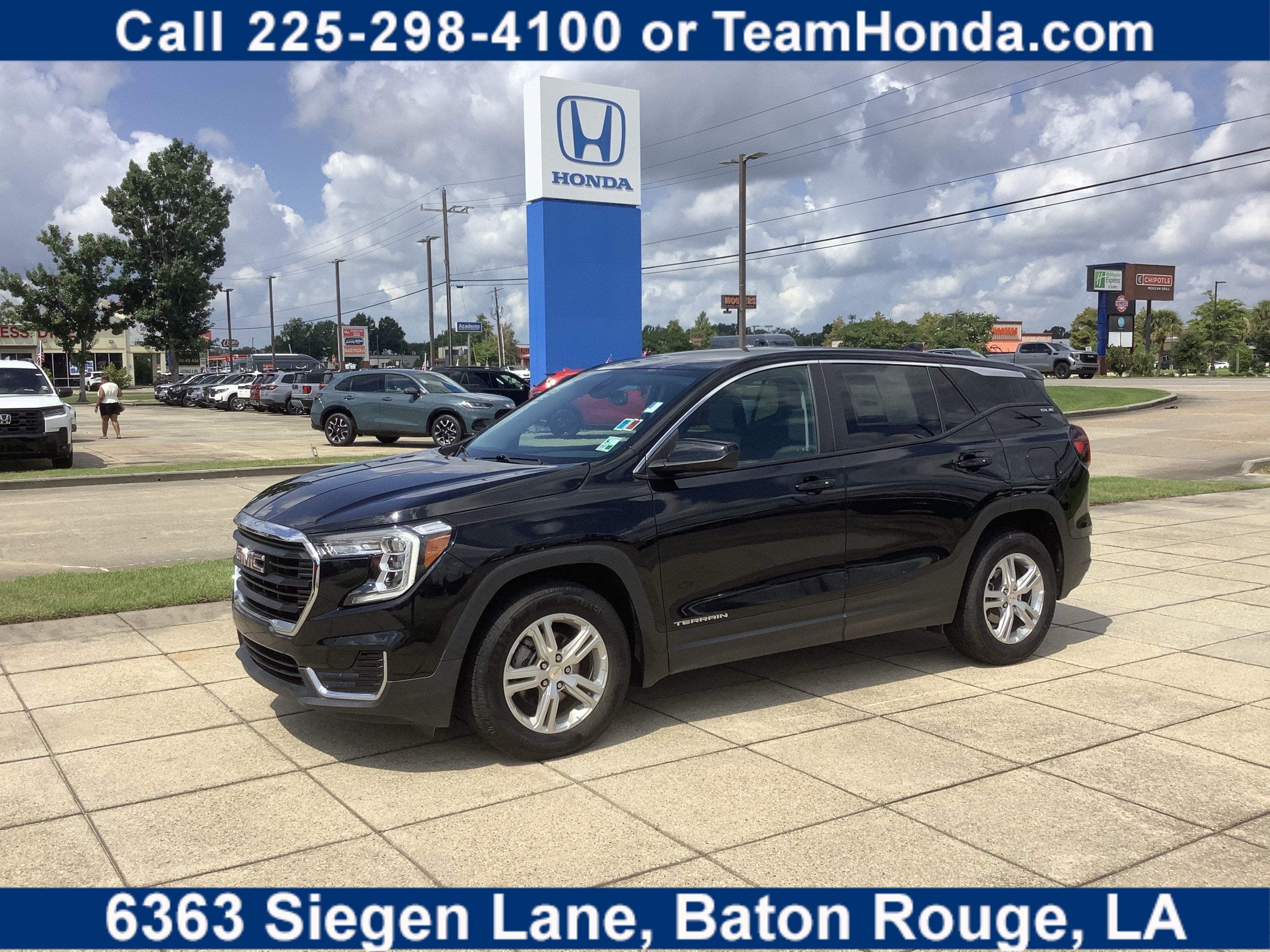 2022 GMC Terrain SLE in Ebony Twilight Metallic — front three-quarter view