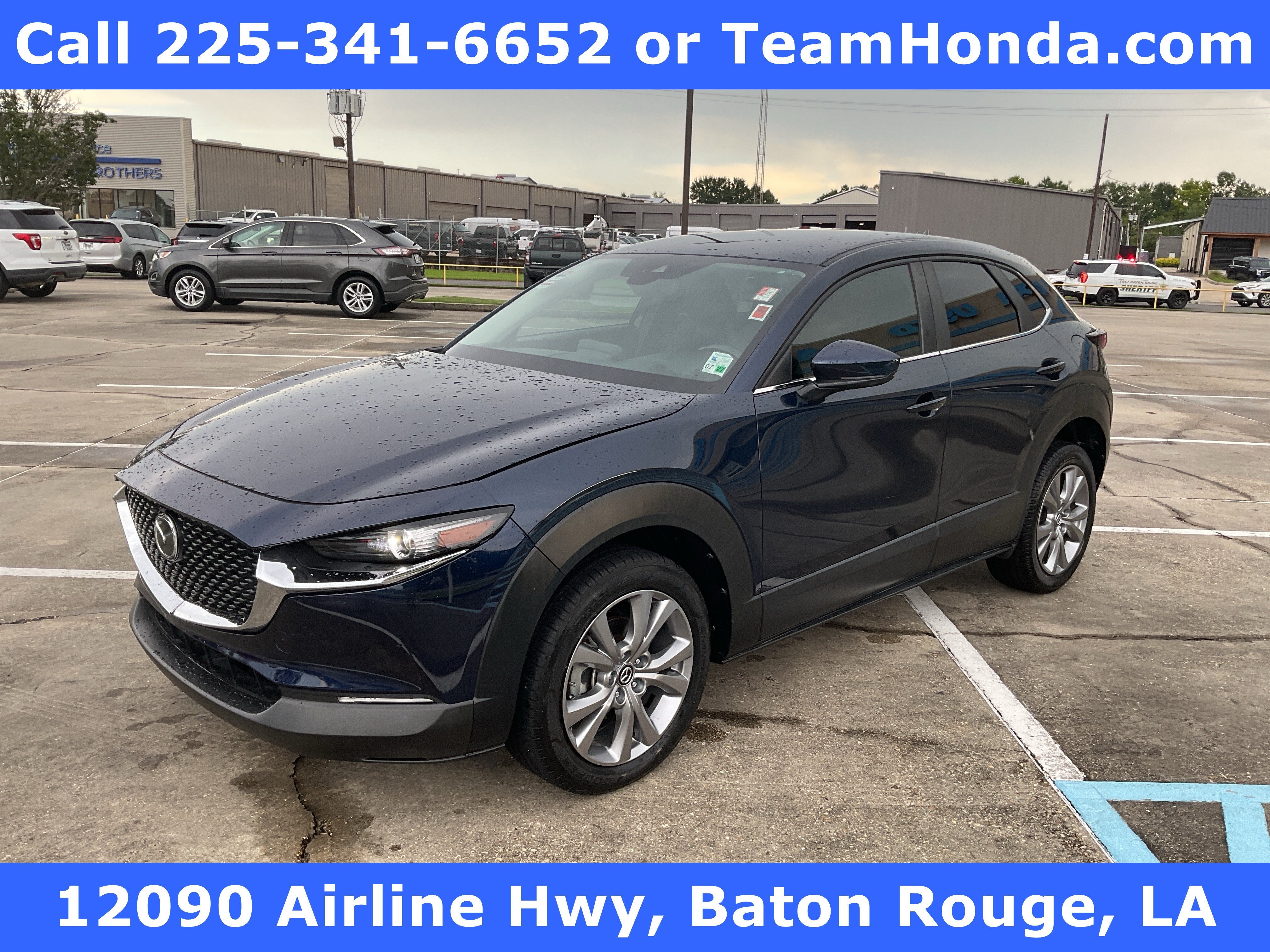 2021 Mazda Mazda CX-30 Select in Deep Crystal Blue Mica — front three-quarter view