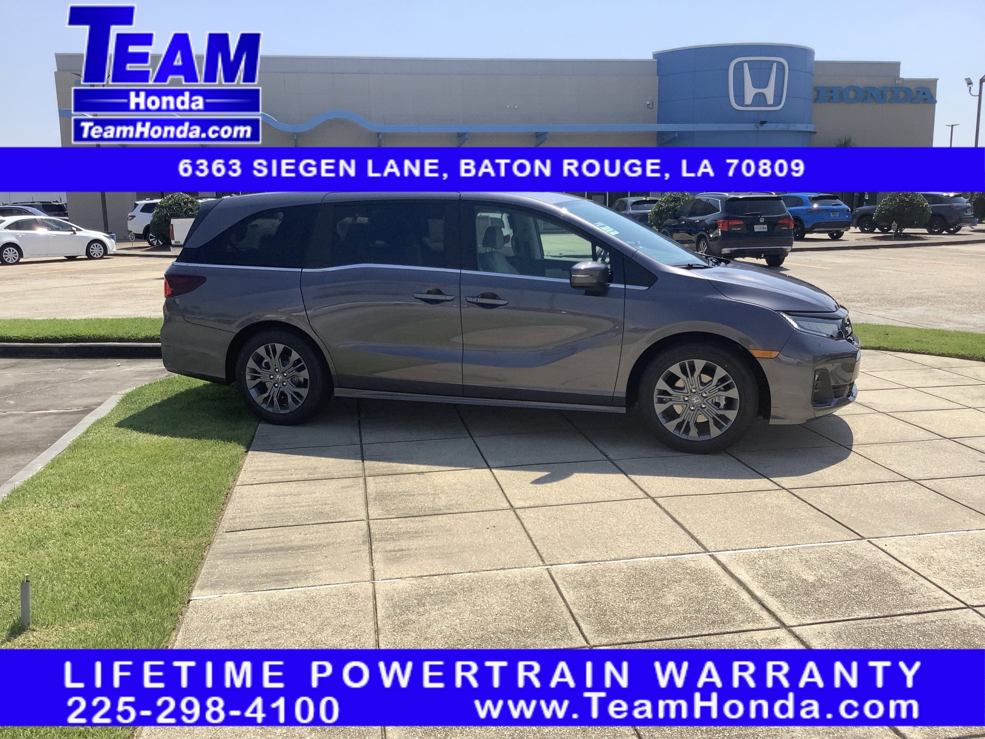 2026 Honda Odyssey Touring in Modern Steel Metallic — front three-quarter view
