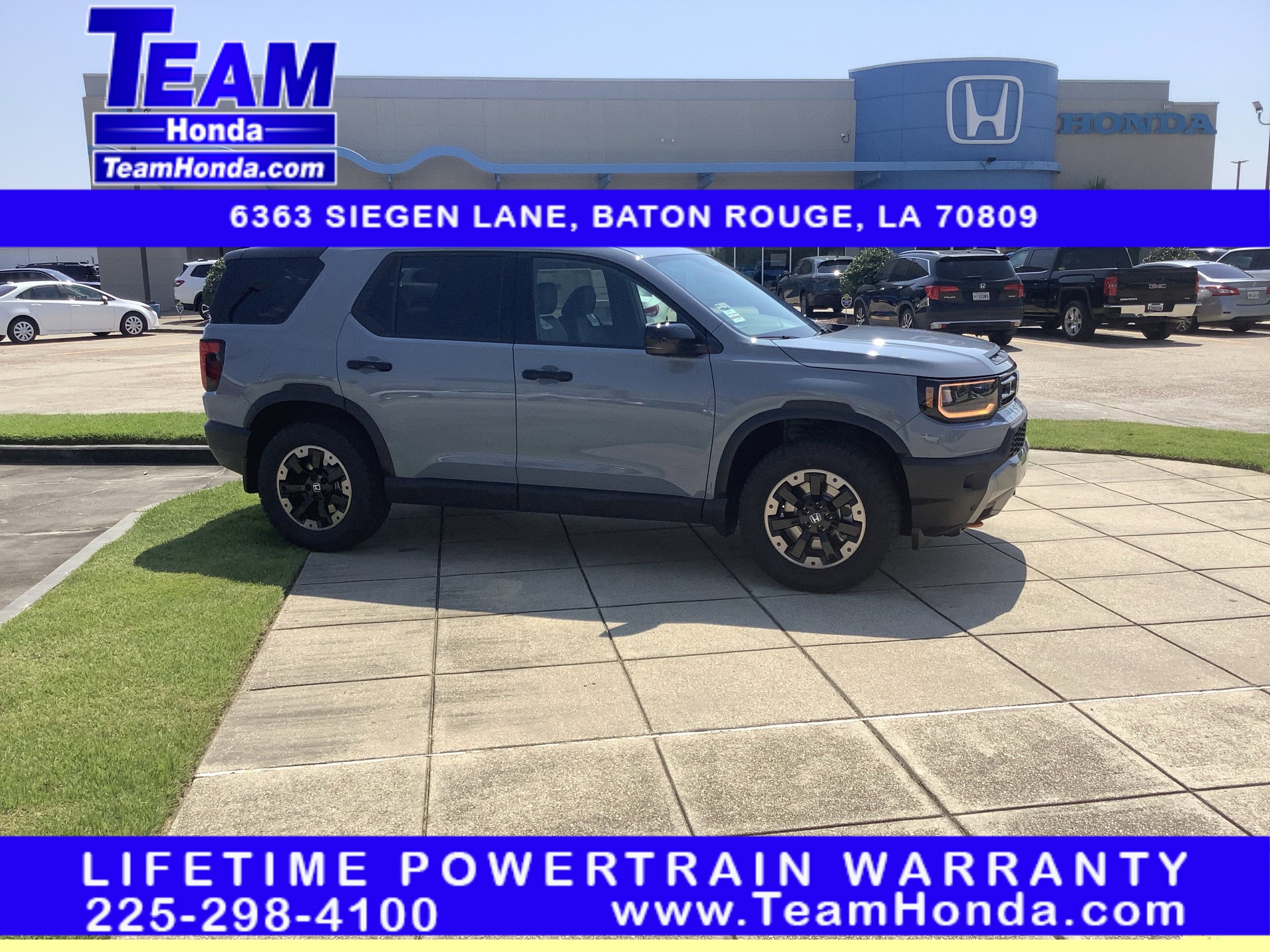 2026 Honda Passport TrailSport Elite in Sonic Gray Pearl — front three-quarter view