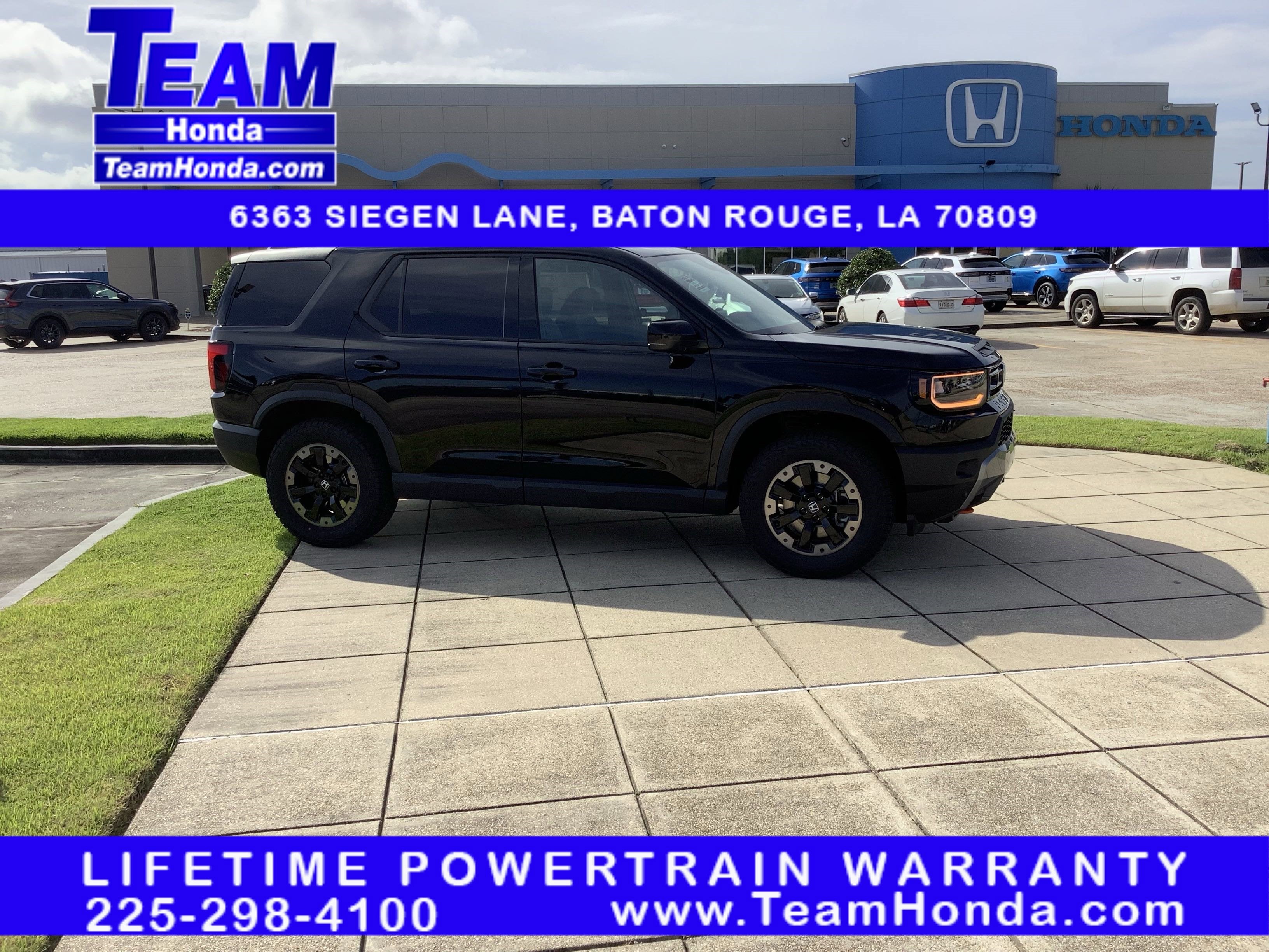 2026 Honda Passport TrailSport Elite in Crystal Black Pearl — front three-quarter view