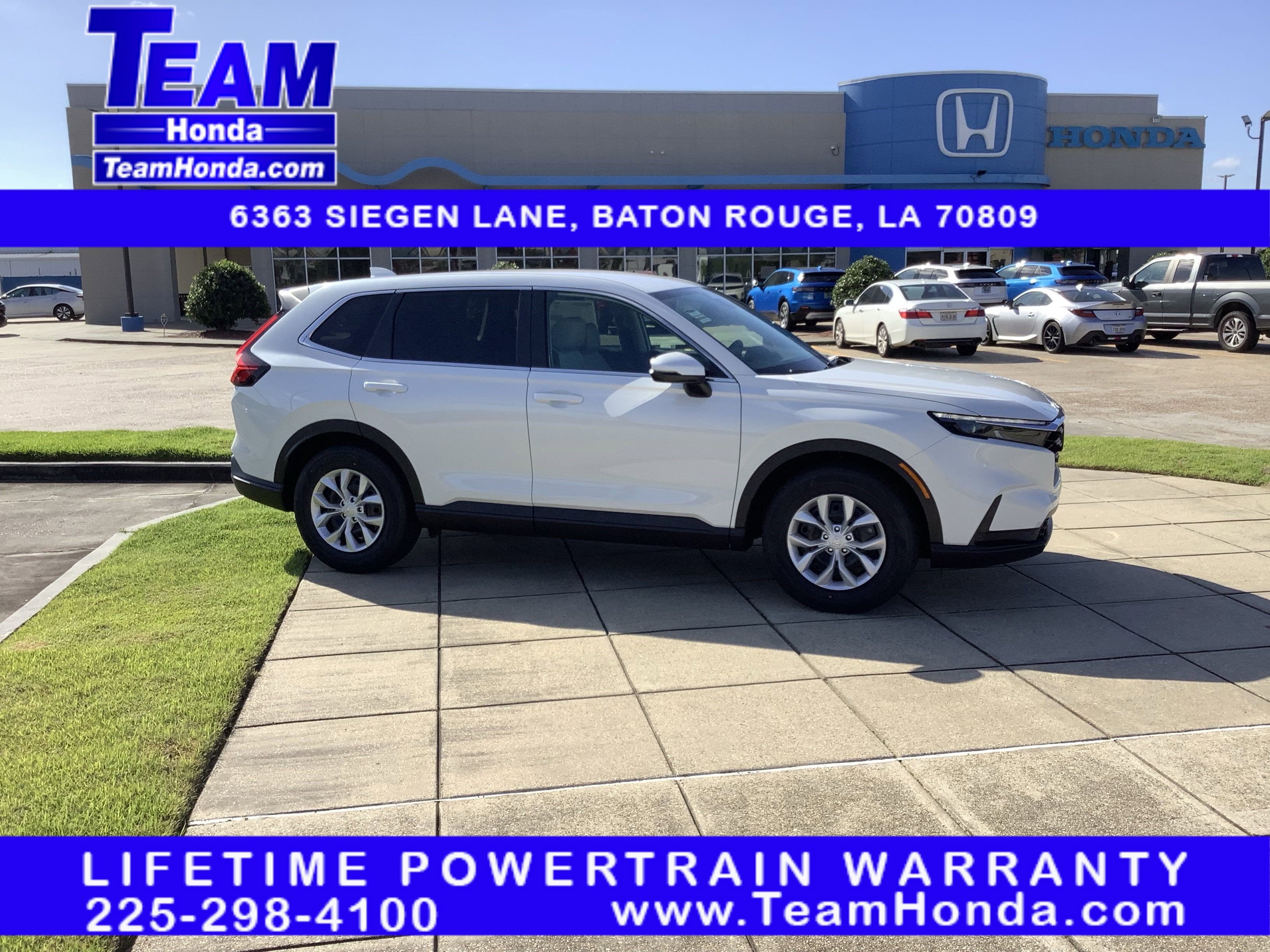 2026 Honda CR-V LX in Platinum White Pearl — front three-quarter view
