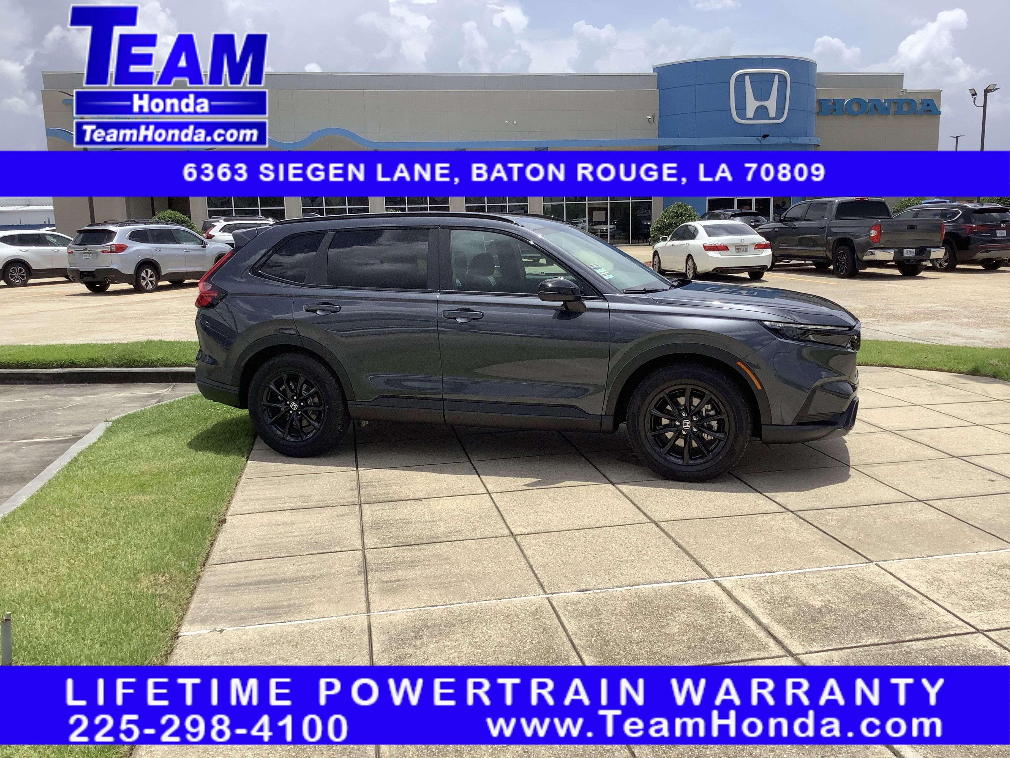 2026 Honda CR-V Hybrid Sport in Meteorite Gray Metallic — front three-quarter view
