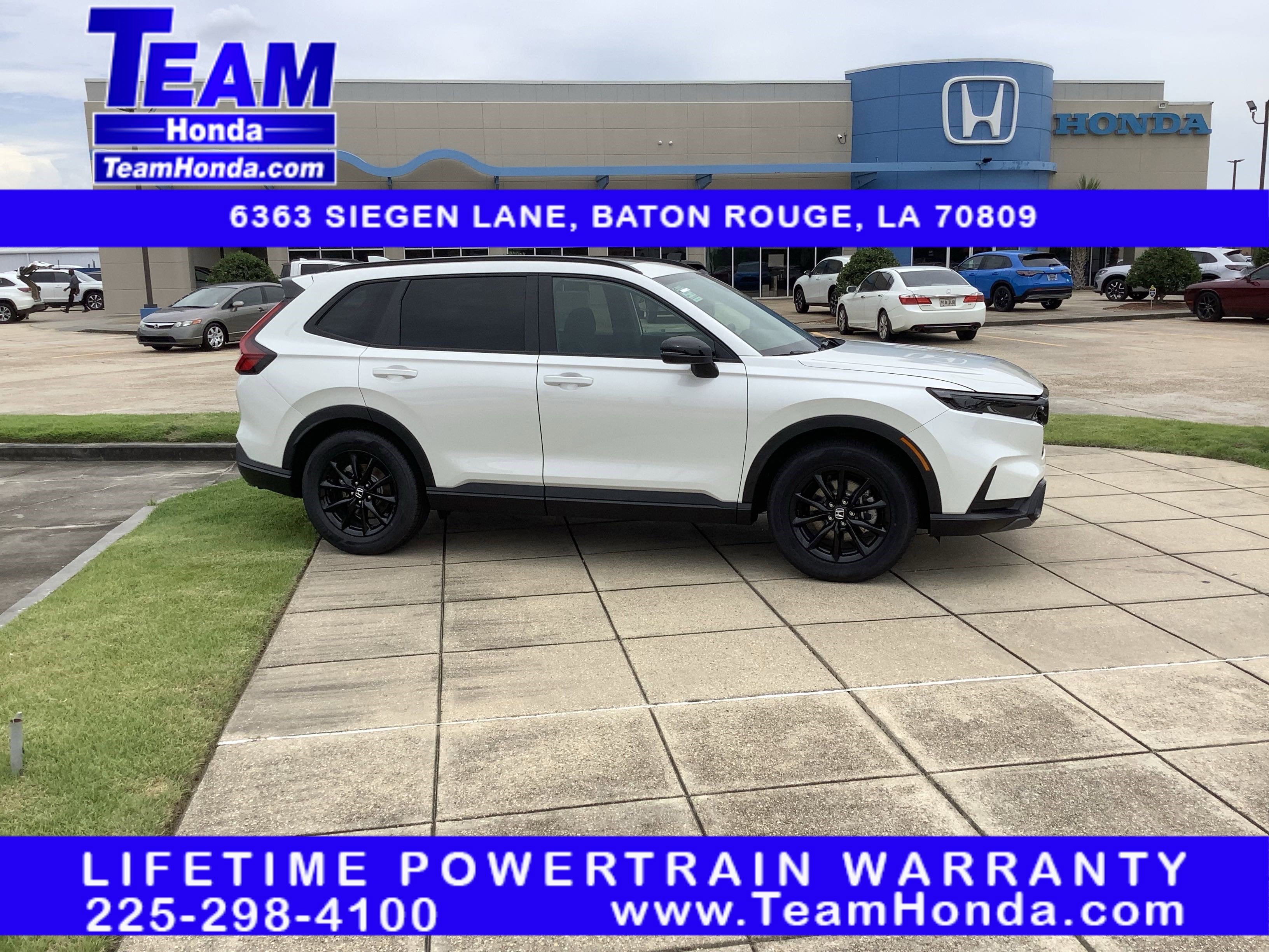 2026 Honda CR-V Hybrid Sport in Platinum White Pearl — front three-quarter view