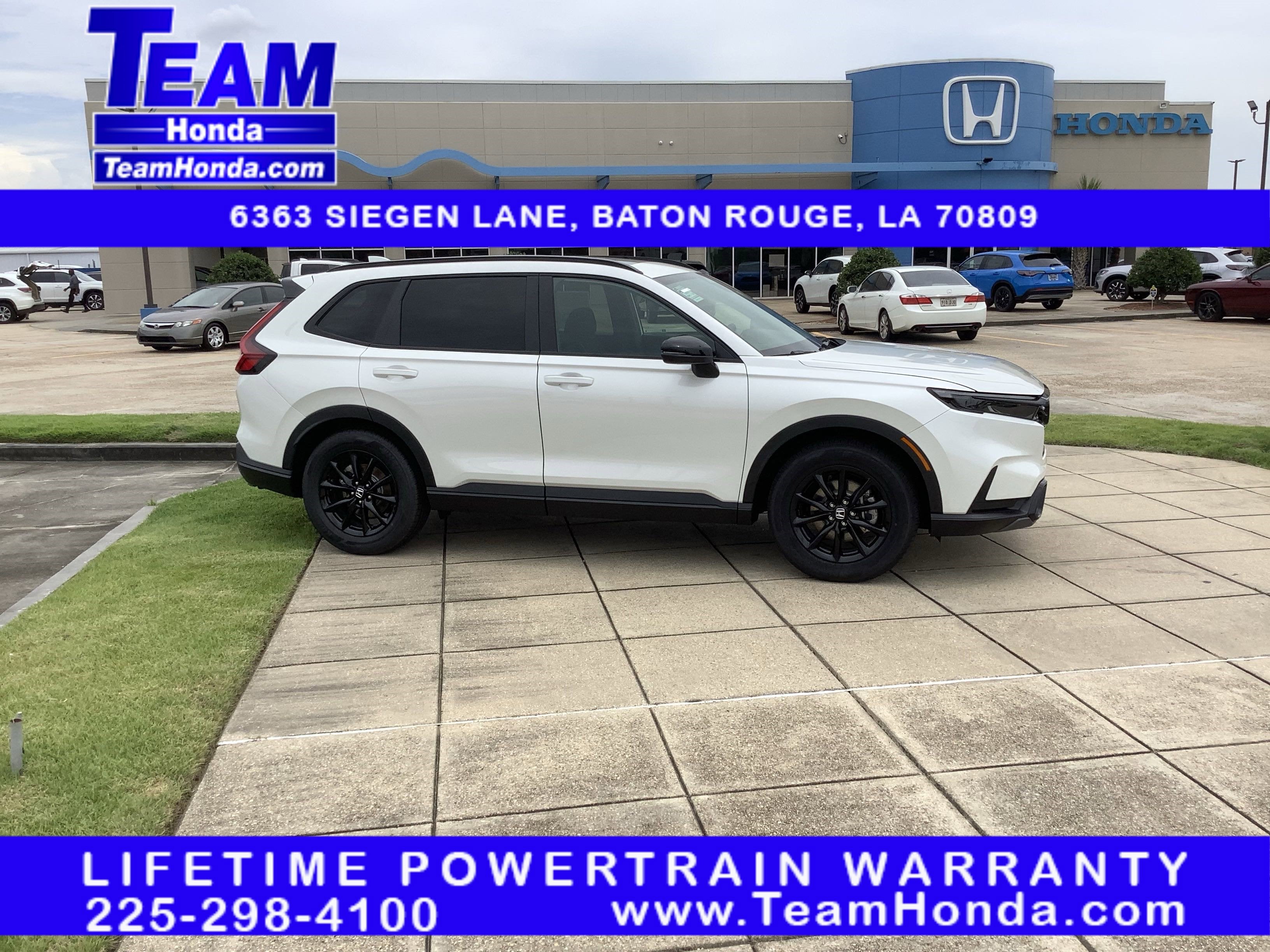 2026 Honda CR-V Hybrid Sport in Platinum White Pearl — front three-quarter view