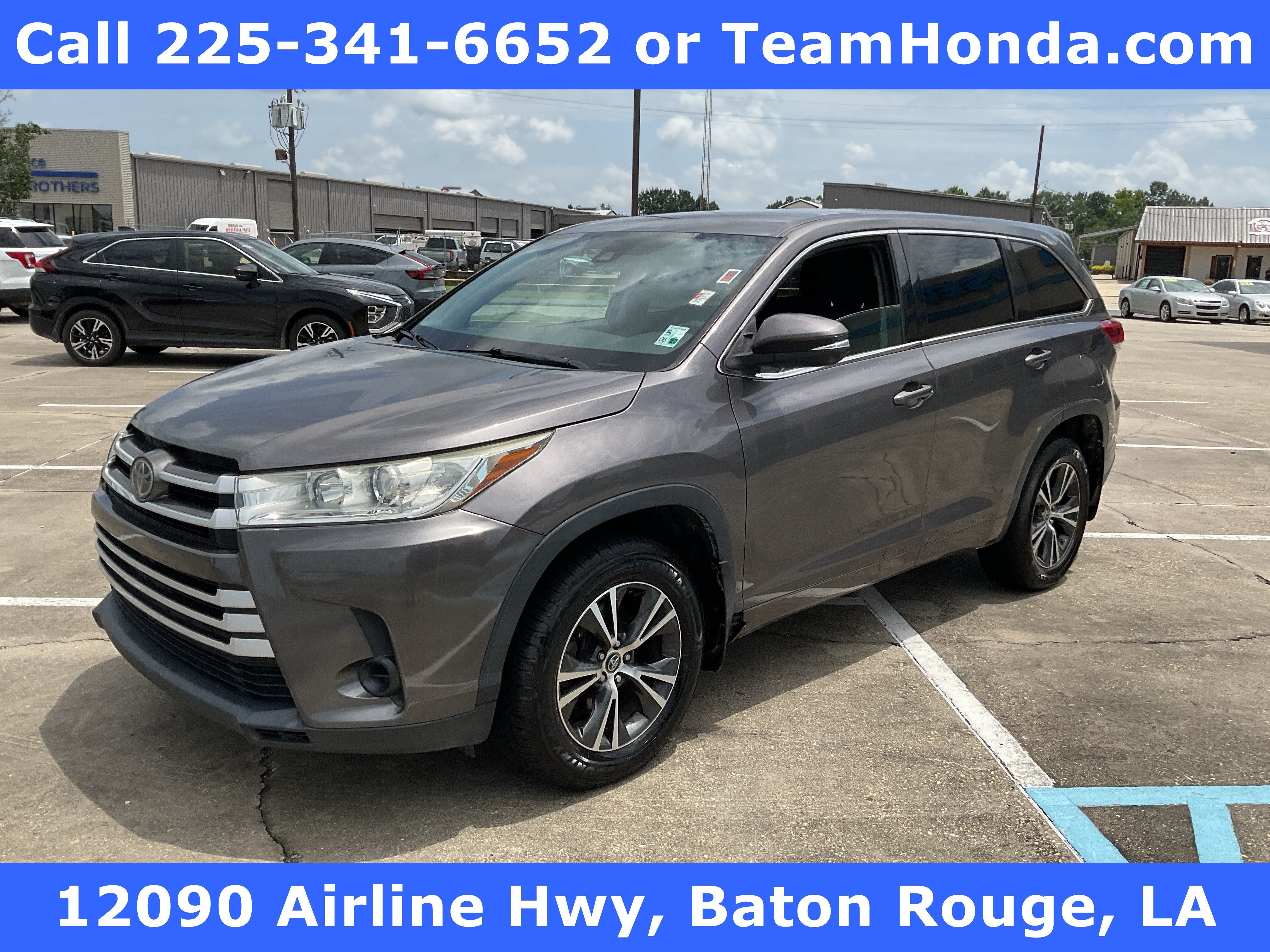 2017 Toyota Highlander LE in Predawn Gray Mica — front three-quarter view
