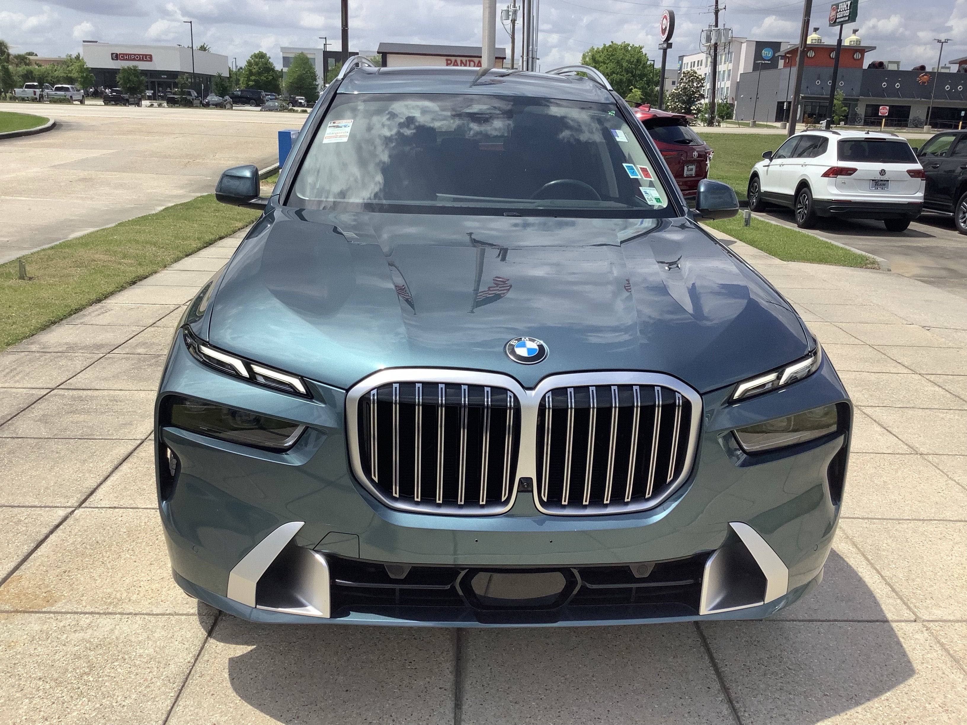 2025 BMW X7 — rear three-quarter view